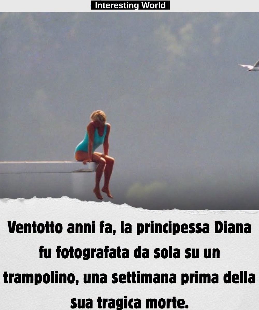 In that photograph there are no smiles to the crowd. There is only one woman sitting alone on the trampoline of a yacht,